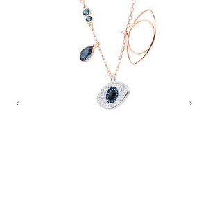 Brand new in box Swarovski necklace and bracelet evil eye set